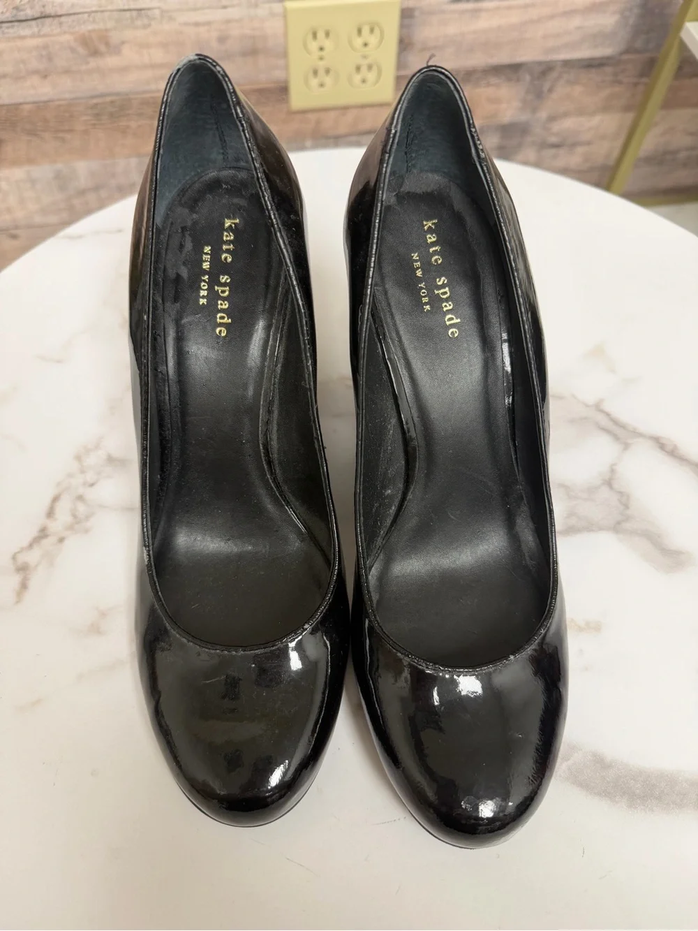 Kate Spade black leather wedge pump 7.5
